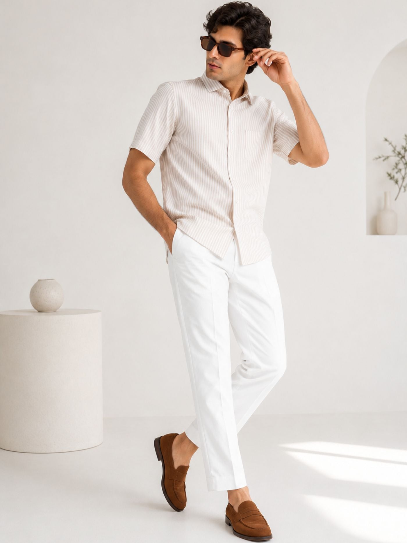 Beige Breeze Shirt styled with white trousers and loafers