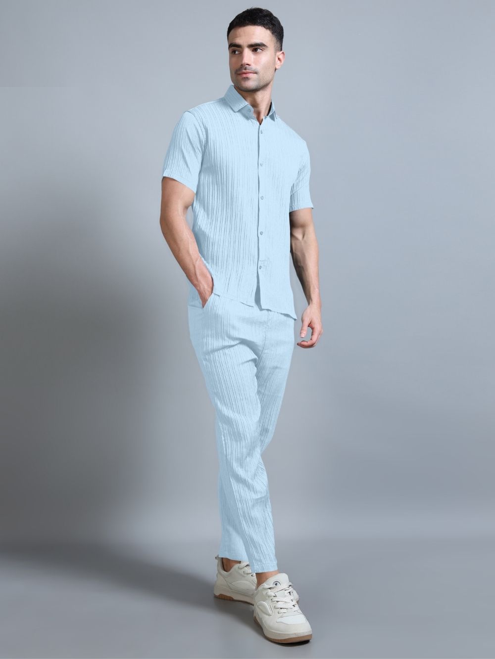 Lifestyle view of men’s sky blue cord set casual style