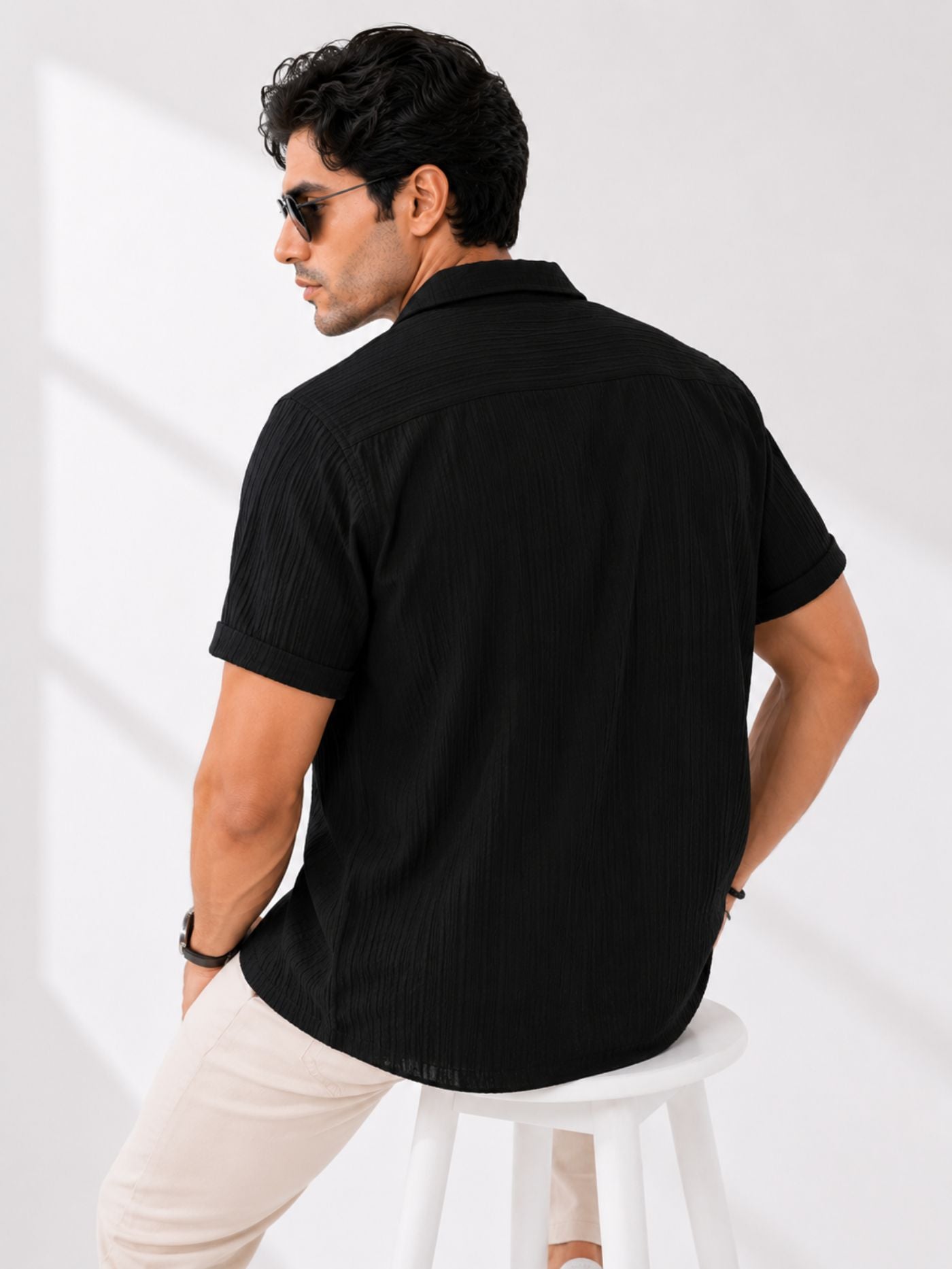 Men’s Veyra Performance Shirt with plain black textured bac