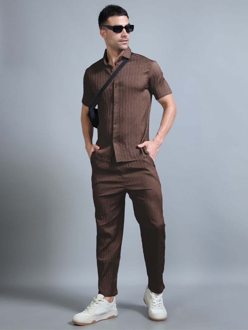 Men’s brown cord set walking pose