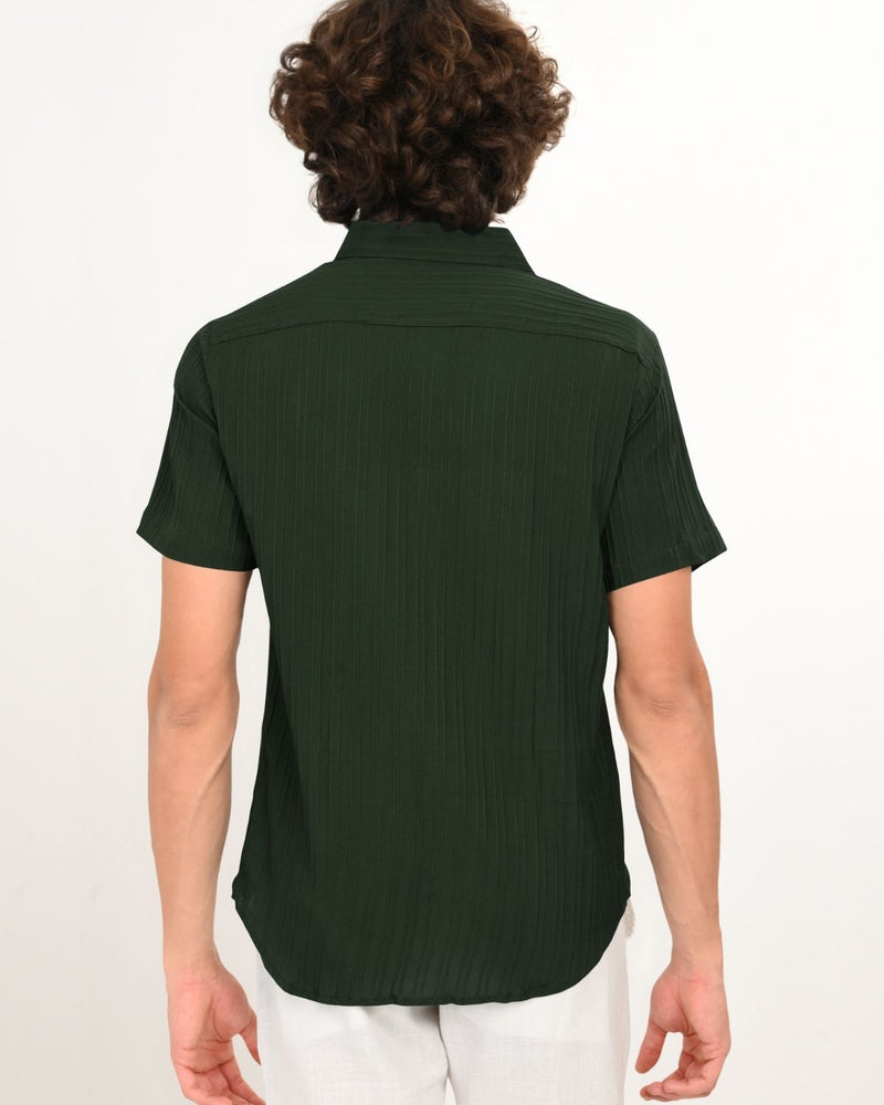 Back view of dark green textured short-sleeve shirt for men.