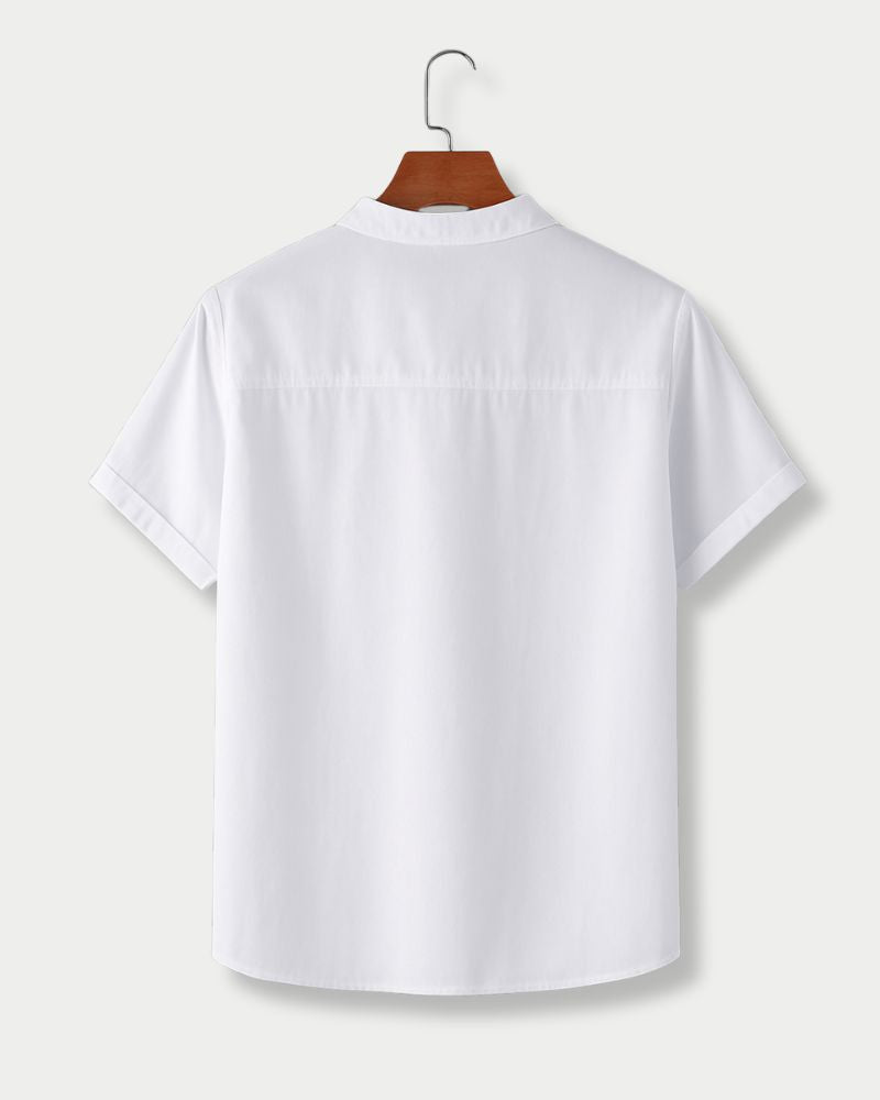 Back view of men's white mandarin collar shirt with rolled sleeves

