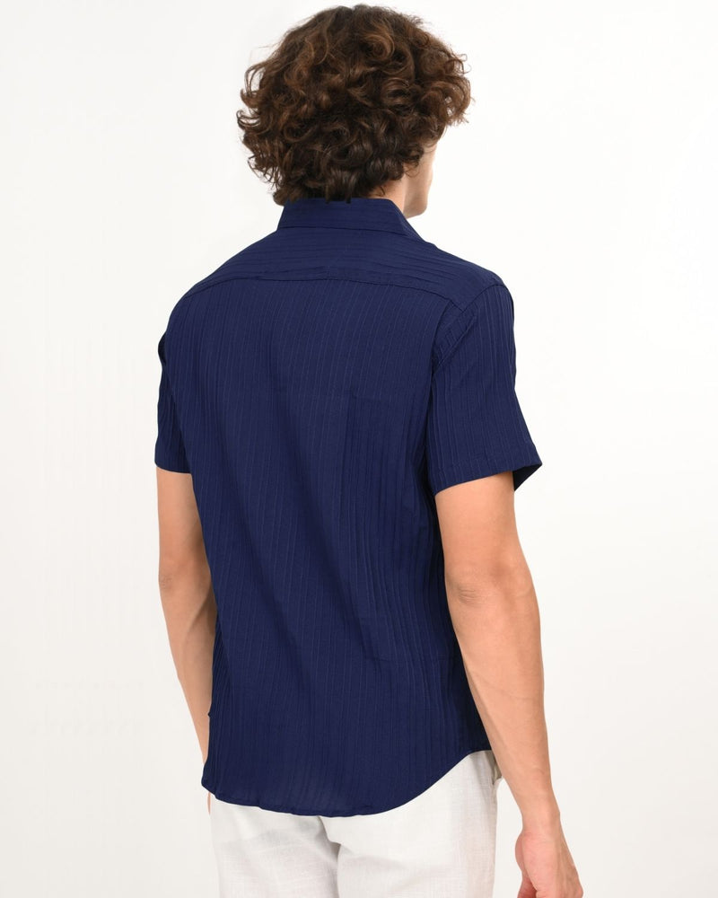 Back view of navy blue textured short-sleeve shirt for men