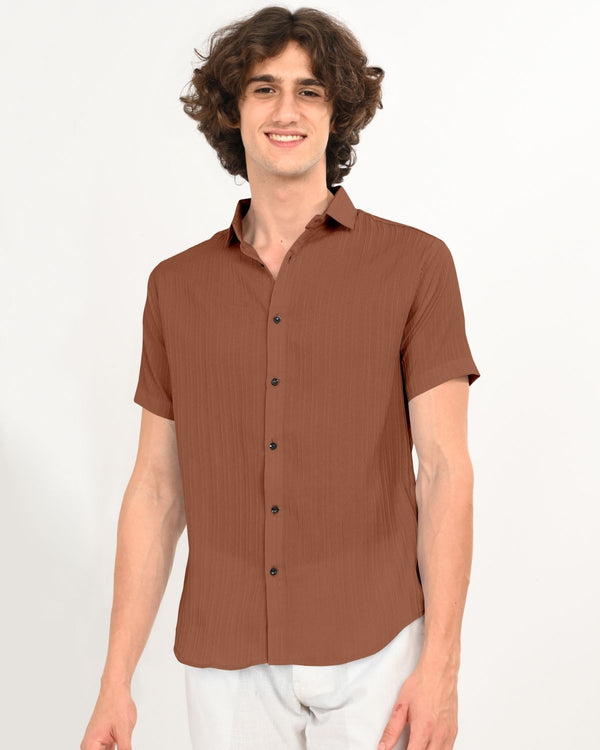 Back view of rust brown textured short-sleeve men’s shirt