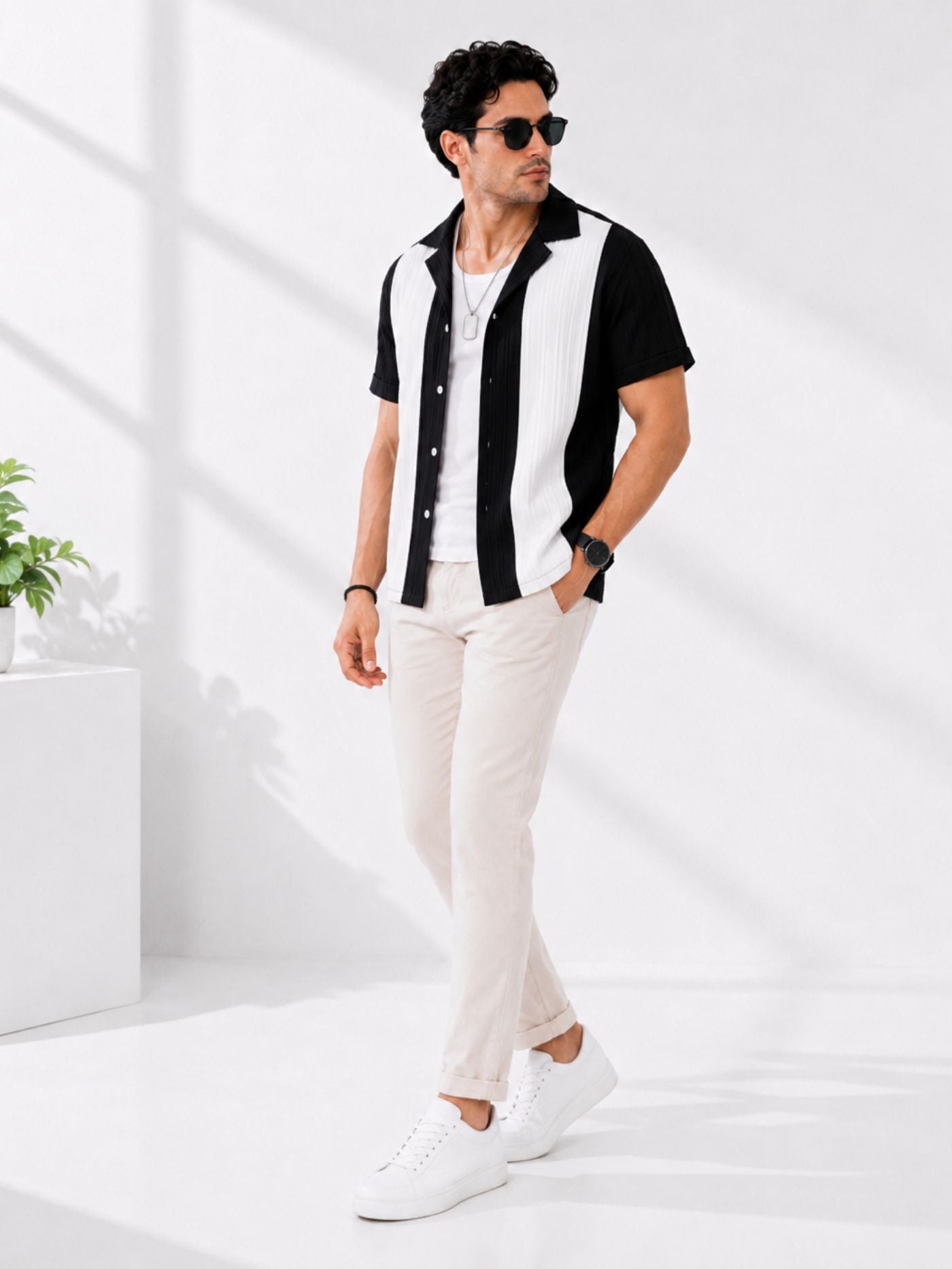 Black and Pearl Half Sleeve Shirt styled with beige trousers