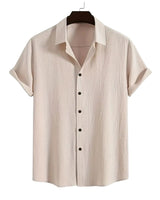 cement gray short-sleeve shirt on a hanger against a white background