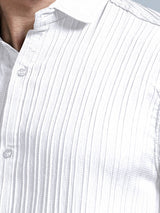 Close-up of textured ivory white cord fabric