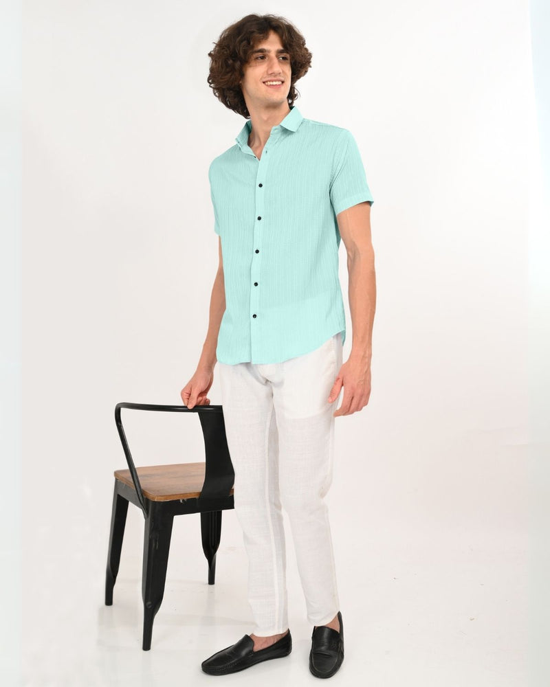 Close front view of mint green textured short-sleeve shirt for men