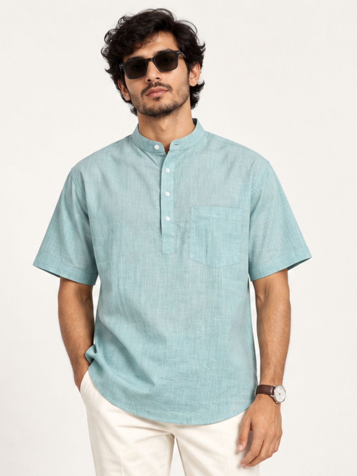 Front view of Aavir seafoam blue cotton kurta shirt with Mandarin collar, half sleeves and chest pocket.