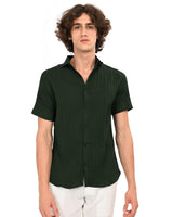 Front view of a man in a dark green textured casual shirt with button closure.