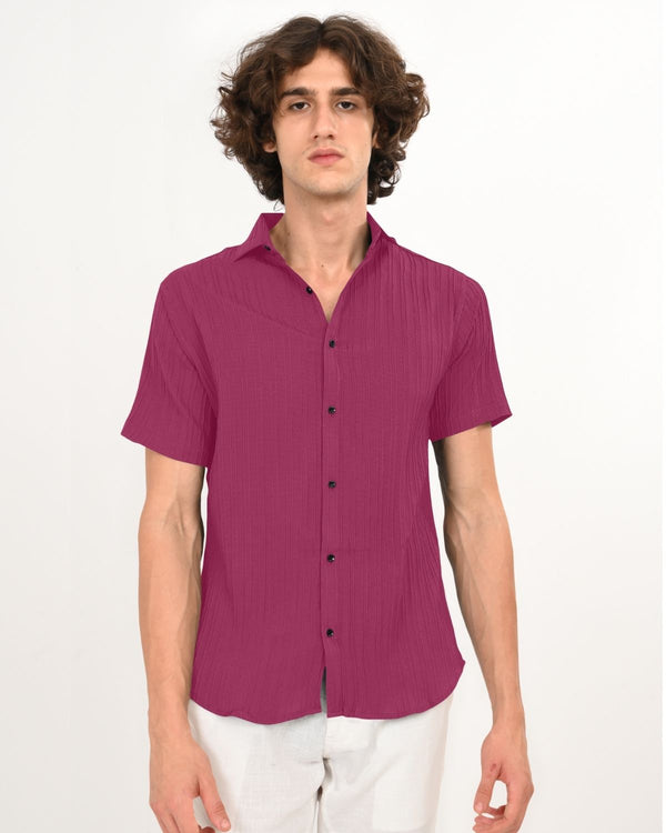 Front view of magenta textured short-sleeve shirt.