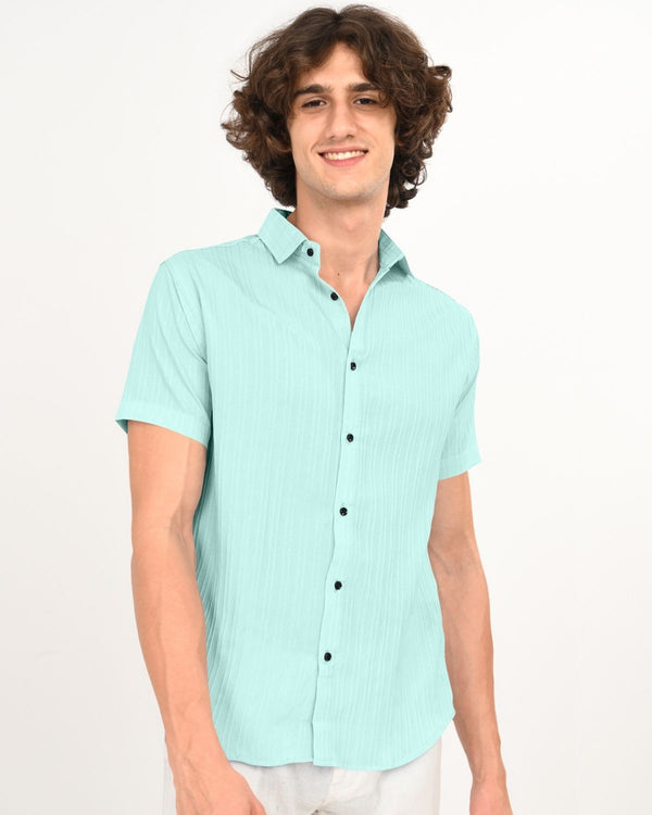 Front view of mint green textured short-sleeve shirt for men