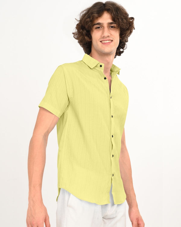 Lime green shirt with black buttons collar