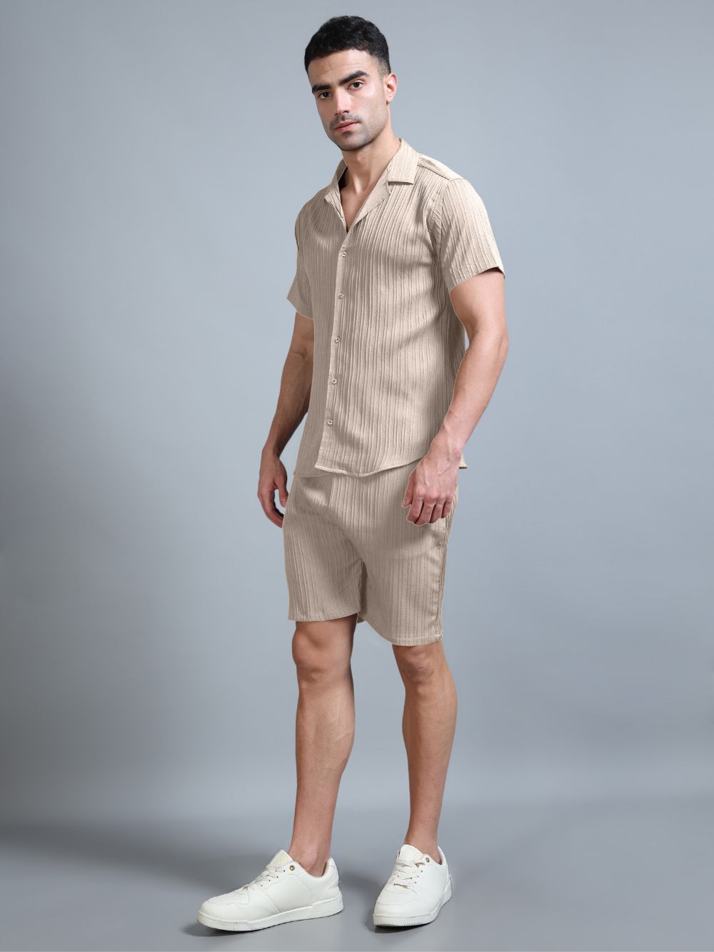 Man in Sahara Mist co-ord hands in pockets
