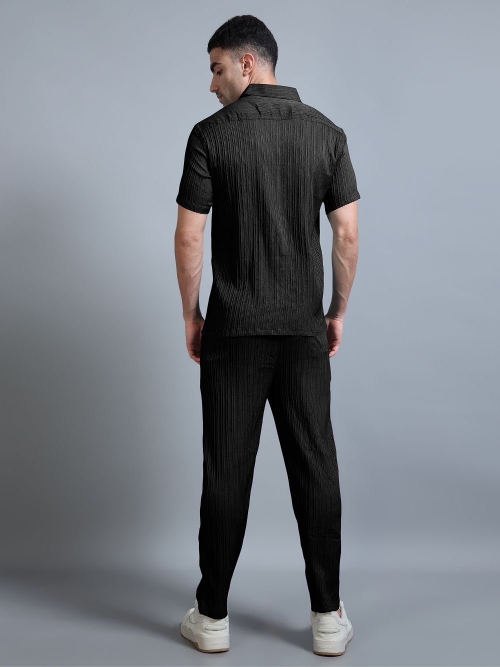 Men’s black cord set back view