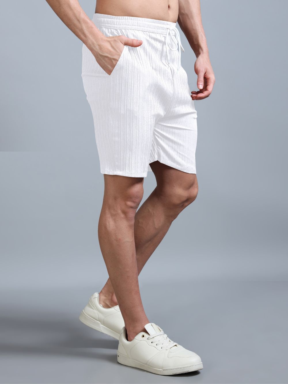 Men’s casual summer outfit in white co-ord set, standing pose