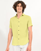 Model wearing lime green textured summer shirt