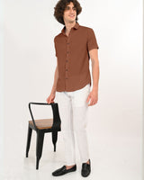 Side angle of rust brown textured short-sleeve shirt for men