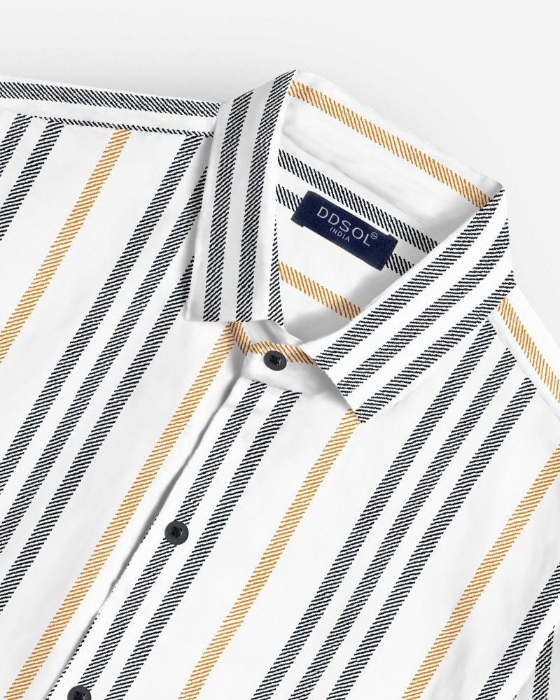 Close-up of men's stripe shirt showing diagonal textured black and mustard lines, black buttons, and classic collar with DDsol label
