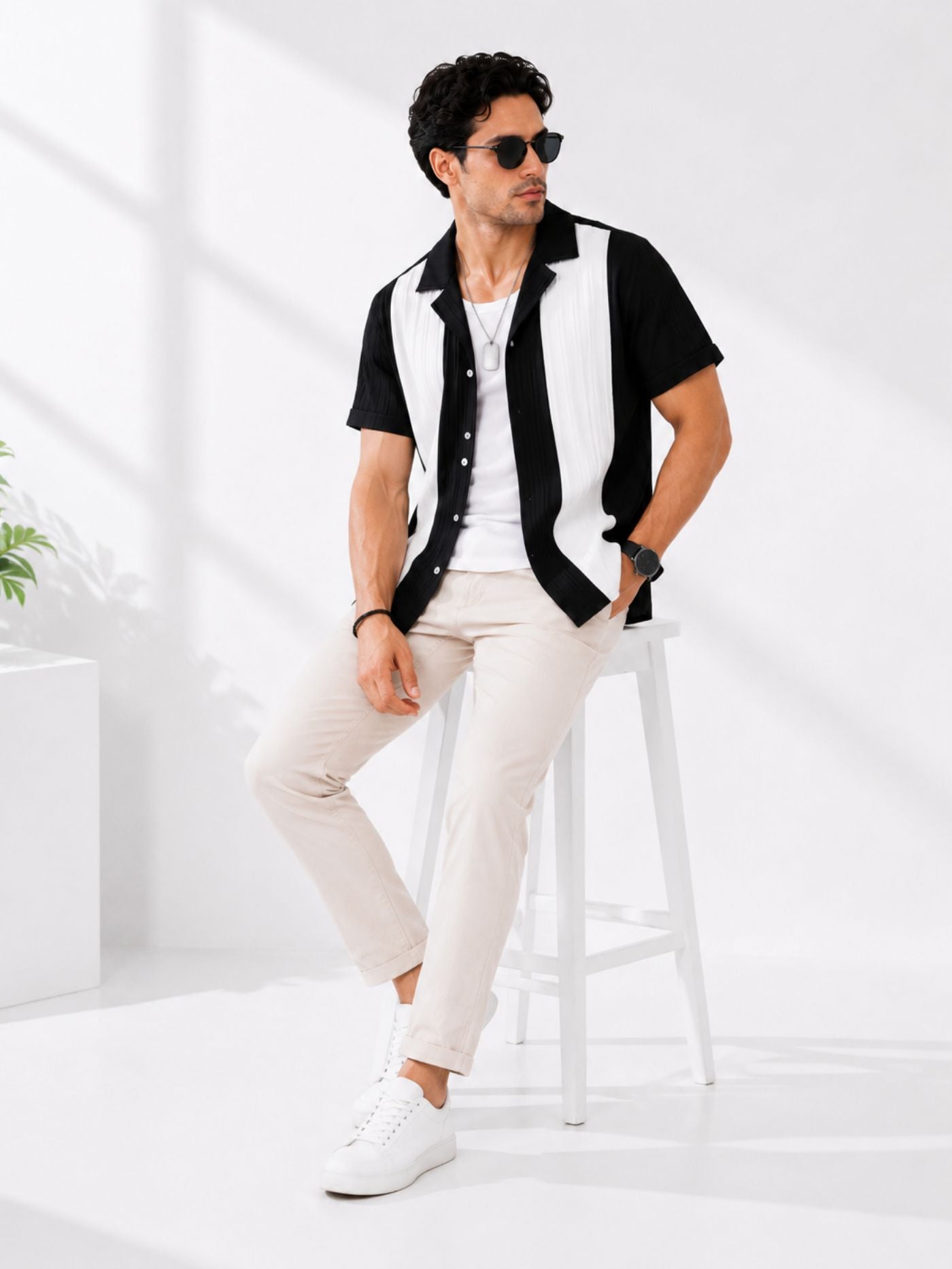 Veyra Textured Performance Shirt Black and Pearl seated pose